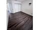 Bedroom featuring wood floors and a sliding door closet at 3324 Haven Beach Way, Las Vegas, NV 89117