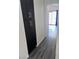 Hallway featuring dark wood cabinets, enhancing storage options at 3324 Haven Beach Way, Las Vegas, NV 89117