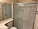 Bathroom featuring single sink vanity, toilet and shower stall with glass door at 3641 Spring Day Ct, Las Vegas, NV 89147