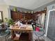 Functional kitchen with wood cabinets, stainless steel appliances, and a central island for food preparation and dining at 415 Golden State St, Henderson, NV 89012