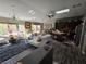 Spacious living area with comfortable seating, modern lighting, and an open layout perfect for entertaining guests at 415 Golden State St, Henderson, NV 89012