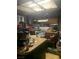 A kitchen with an island, wooden cabinets, and an oven at 4233 Kensington Way, Las Vegas, NV 89108