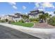 Beautiful single-story home featuring lush landscaping and a well-manicured lawn at 4430 Angelo Rosa St, Las Vegas, NV 89135