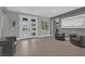 Spacious foyer with herringbone floors, neutral walls, and elegant furnishings at 4430 Angelo Rosa St, Las Vegas, NV 89135
