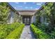 Charming front entrance with a tiled walkway and meticulously maintained landscaping at 4430 Angelo Rosa St, Las Vegas, NV 89135