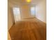 Spacious bedroom with plush carpeting and natural light from a large window at 45 Maleena Mesa St # 1321, Henderson, NV 89074