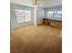 Carpeted bedroom with natural light, built-in desk and storage creating a versatile and functional space at 45 Maleena Mesa St # 1321, Henderson, NV 89074