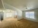 Spacious living room featuring neutral paint, ceiling fan and plush carpeting, perfect for relaxation at 45 Maleena Mesa St # 1321, Henderson, NV 89074