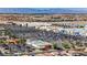 Aerial view of the shopping center, with ample parking, big retailers, and a neighborhood in the background at 5438 Jacobs Field St, Las Vegas, NV 89148