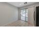 Dining Area with tile floors and sliding doors leading to the outside at 5438 Jacobs Field St, Las Vegas, NV 89148