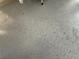 Durable garage floor featuring an epoxy coating, with an attractive, speckled finish at 5438 Jacobs Field St, Las Vegas, NV 89148