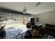 Spacious garage with an open door, providing ample space for parking and storage, with neighborhood view at 5438 Jacobs Field St, Las Vegas, NV 89148