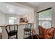 Kitchen with a breakfast bar overlooking the dining area at 5438 Jacobs Field St, Las Vegas, NV 89148