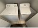 Close up of a washer and dryer in a home's dedicated laundry area at 5438 Jacobs Field St, Las Vegas, NV 89148