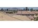 Residential rooftops with a clear view of the Las Vegas skyline in the distance at 5556 Cornadelo Range Rd, Las Vegas, NV 89113