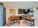 Comfortable dining area and kitchen area, perfect for entertaining guests at 5556 Cornadelo Range Rd, Las Vegas, NV 89113