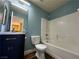 Bathroom featuring shower and tub combo, and modern vanity with wood-look floors at 5846 Lee Fairy Ct, Las Vegas, NV 89139