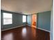 Comfortable bedroom with wood-look floors and ensuite bathroom for added convenience at 5846 Lee Fairy Ct, Las Vegas, NV 89139