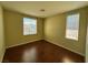 A sunlit bedroom showcases hardwood floors and neutral walls, offering a cozy and inviting atmosphere at 5846 Lee Fairy Ct, Las Vegas, NV 89139