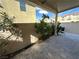 A backyard covered patio shows trees and shrubs, providing an outdoor space for relaxation at 5846 Lee Fairy Ct, Las Vegas, NV 89139