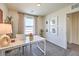 Bright office with natural light, a desk, shelves, and modern decor at 6144 Aster Garden St # 133, North Las Vegas, NV 89081