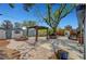 Backyard features a well maintained patio area with trellis, landscaping and plenty of space at 619 D Avenue, Boulder City, NV 89005