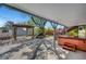 Backyard with hot tub, trellis covered seating area and plenty of space for relaxing and entertaining at 619 D Avenue, Boulder City, NV 89005