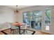 Cozy dining area with outdoor access and views of a well-appointed patio at 619 D Avenue, Boulder City, NV 89005