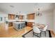 Open kitchen with a central island, modern appliances, and views into the dining area at 619 D Avenue, Boulder City, NV 89005