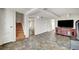 Spacious living room features tile floors, stairs and ceiling fan at 619 D Avenue, Boulder City, NV 89005