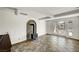 Bright living room boasts a fireplace and sliding glass doors at 619 D Avenue, Boulder City, NV 89005