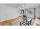 Bright living room featuring hardwood floors, stylish furniture, large windows, and a fresh, airy feel at 619 D Avenue, Boulder City, NV 89005