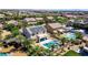 Aerial backyard view featuring a pool with integrated spa, covered bar, and solar panels atop the home at 6489 Crest Estates St, Las Vegas, NV 89131