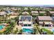 Aerial view of backyard showcasing a modern pool, spa, covered patio, desert landscaping and solar panels at 6489 Crest Estates St, Las Vegas, NV 89131