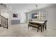 Elegant dining area featuring modern chandelier and tile floors at 6489 Crest Estates St, Las Vegas, NV 89131