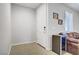 Entryway featuring a white door, tile floors and beverage cooler at 6489 Crest Estates St, Las Vegas, NV 89131