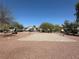 Community sand volleyball court with picnic benches and shade at 6617 Lavender Lilly Ln # 1, North Las Vegas, NV 89084