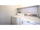 Laundry area featuring a white washer and dryer at 6617 Lavender Lilly Ln # 1, North Las Vegas, NV 89084