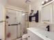 Updated bathroom featuring modern vanity, framed shower, and modern fixtures at 7047 Mountain Meadow Ln, Las Vegas, NV 89147