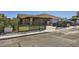 Charming single-story home featuring a gated front yard and covered parking at 7047 Mountain Meadow Ln, Las Vegas, NV 89147