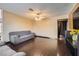 Living room with hardwood floors, ceiling fan and access to other rooms at 7047 Mountain Meadow Ln, Las Vegas, NV 89147