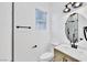 Bathroom with modern vanity, updated fixtures, and shower with glass door at 7909 Smokey Ridge Ct, Las Vegas, NV 89131