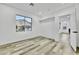 Bedroom showcasing wood-look flooring and natural light from the window at 7909 Smokey Ridge Ct, Las Vegas, NV 89131