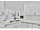 Modern kitchen featuring quartz countertops, stainless steel appliances and an open concept at 7909 Smokey Ridge Ct, Las Vegas, NV 89131