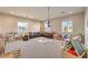 Large bonus room with ample space for ' play, comfortable seating, and lots of natural light at 8445 S Tenaya Way, Las Vegas, NV 89113