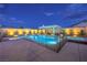 A sparkling pool is surrounded by stylish fencing, offering a safe and elegant outdoor retreat at 8445 S Tenaya Way, Las Vegas, NV 89113