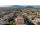 Beautiful neighborhood boasting single-Gathering homes with private pools and manicured lawns, against mountain backdrop at 8617 Copper Ridge Ave, Las Vegas, NV 89129