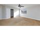 Bedroom with carpet, neutral walls, ceiling fan, and natural lighting from two windows at 8617 Copper Ridge Ave, Las Vegas, NV 89129