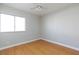 Bedroom with hardwood floors and a window providing ample natural light at 8617 Copper Ridge Ave, Las Vegas, NV 89129
