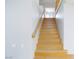 Wooden staircase with neutral walls leading upstairs at 8617 Copper Ridge Ave, Las Vegas, NV 89129
